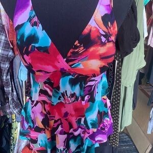 NWT Vanishing Act swim top.size 8